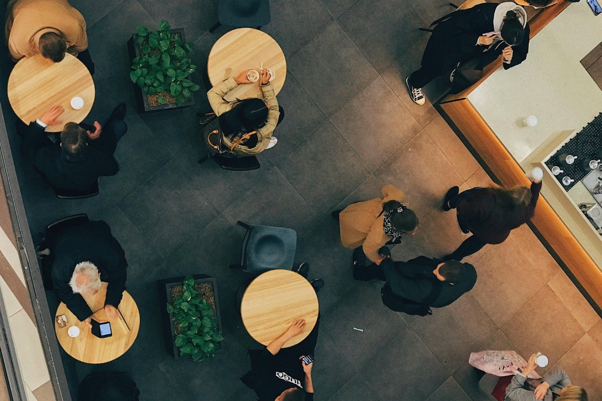 Groups of people sitting together in a cosy communal space.