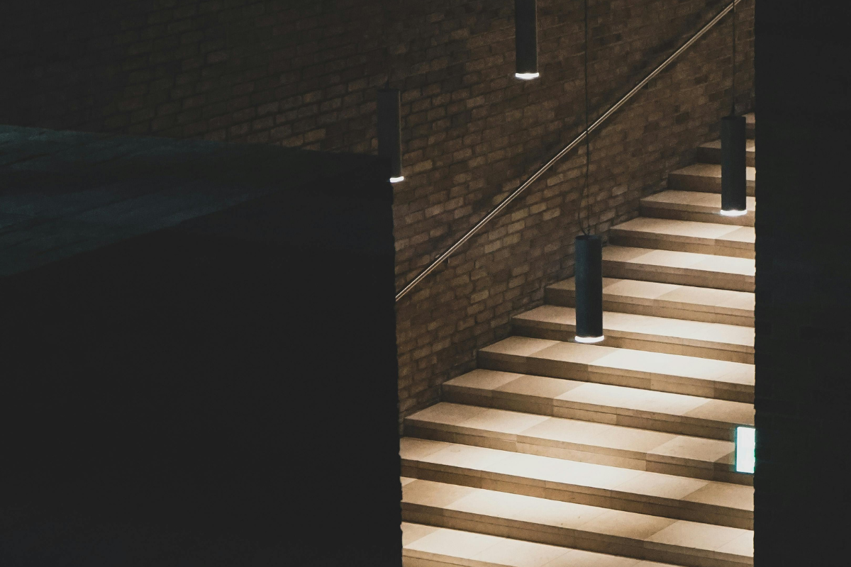 Lighting used to illuminate staircase in a modern commercial building.