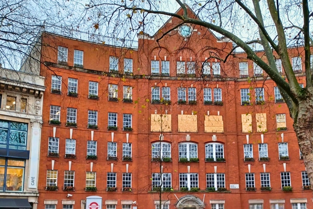 Exterior of 25 Store Street, a red-brick commercial building undergoing HVAC upgrades.