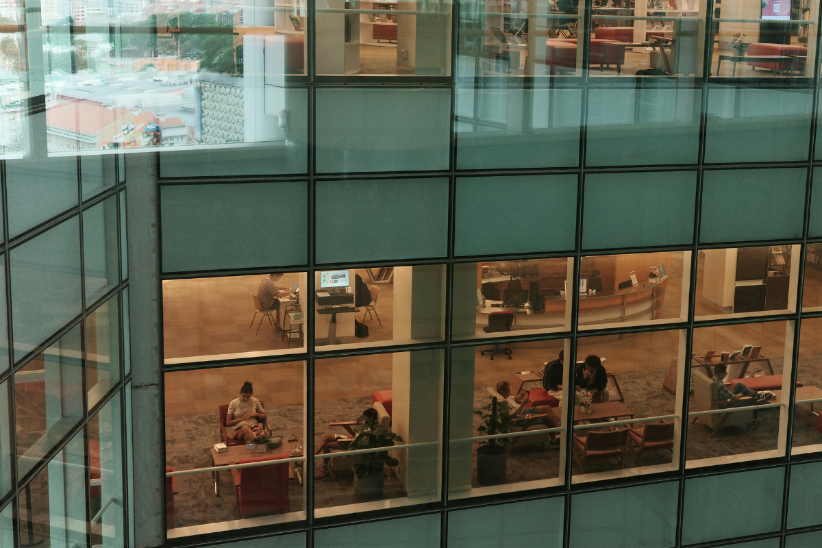 View of a modern office as seen through a glass window.